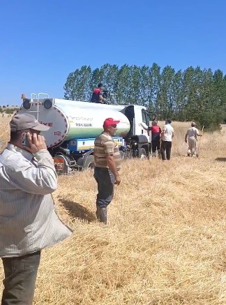 Tavşanlı’da buğday ekili alanda çıkan yangın kısa sürede söndürüldü
