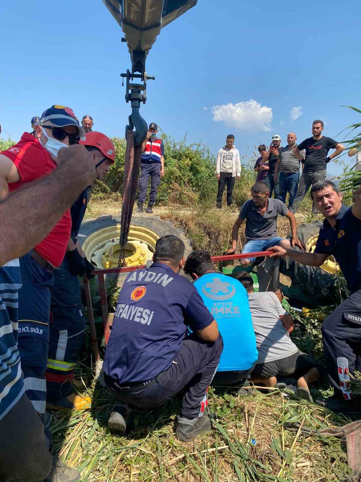 Devrilen traktörün altına kalan şahıs yaralı kurtuldu
