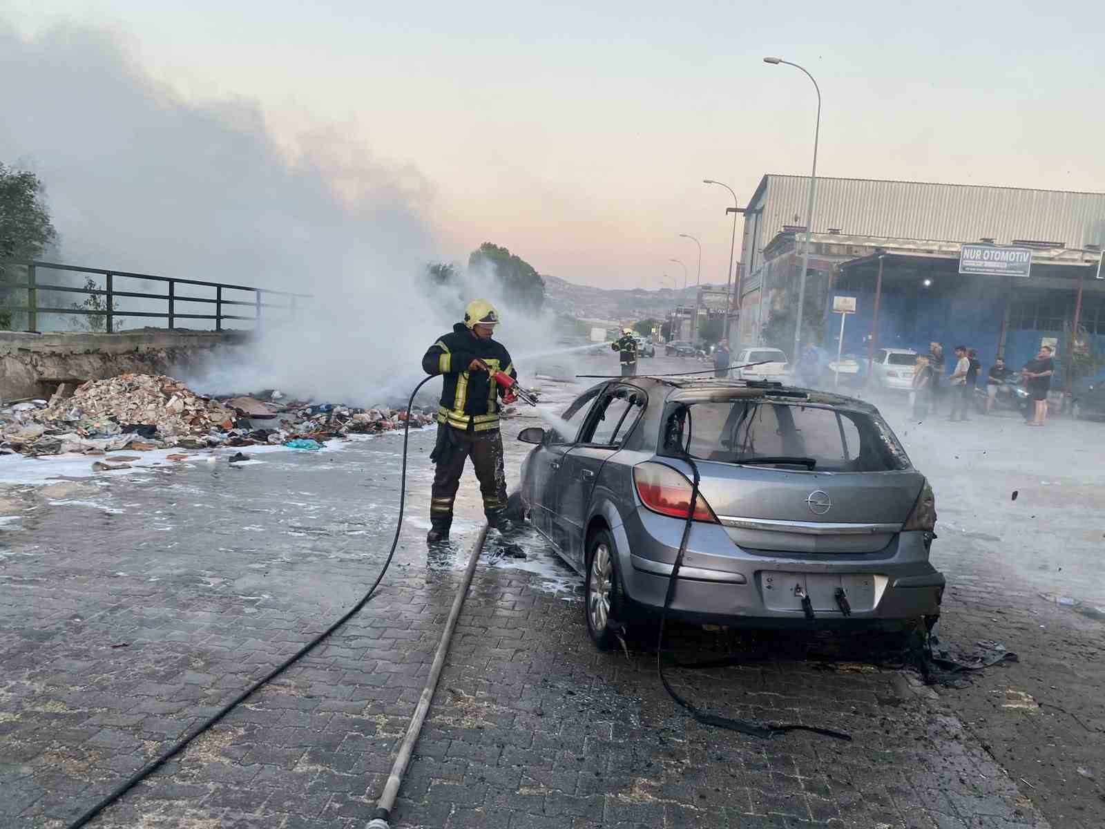 Alevlerin sıçradığı otomobil yandı
