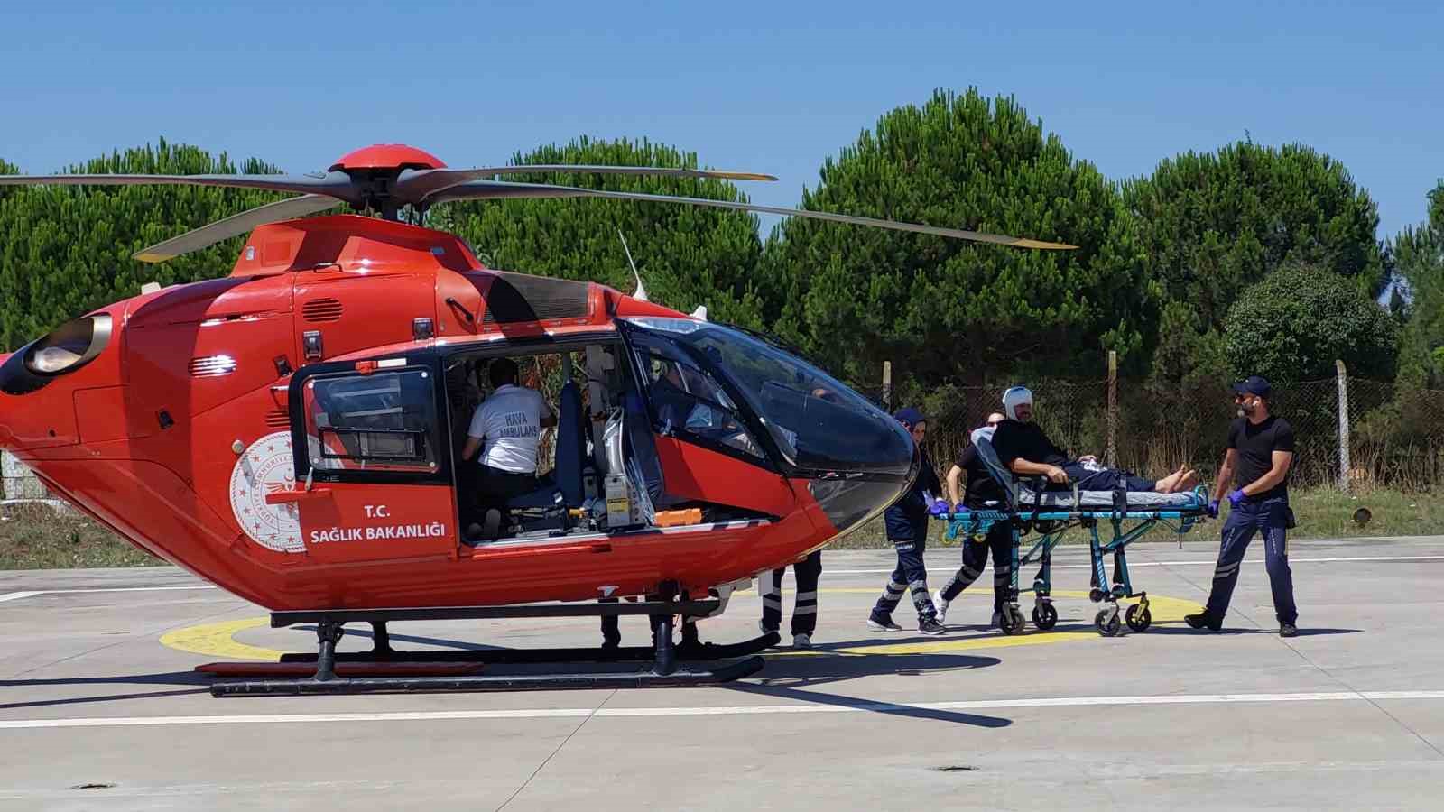 Kafasına harç makinesinin demiri çarpan şahsın yardımına ambulans helikopter yetişti
