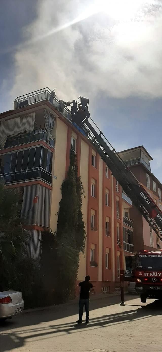 Yanan binada mahsur kalanları itfaiye kurtardı
