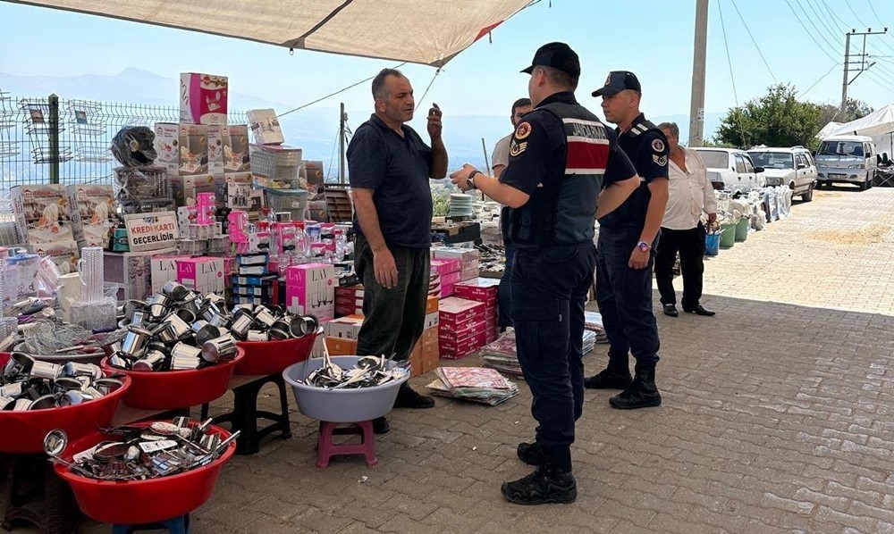 Karacasu jandarması vatandaşları sahte para ve dolandırıcılığa karşı bilgilendirdi
